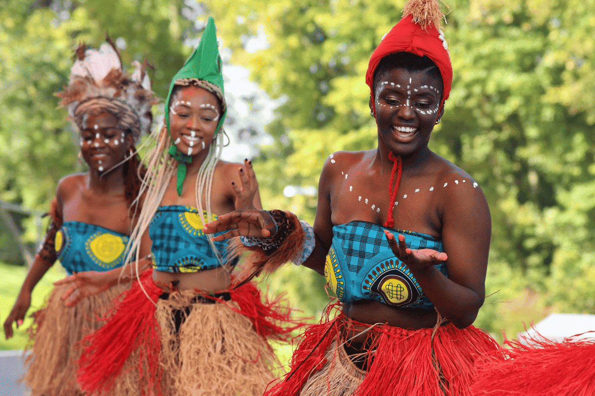 Traditional Sierra Leone dance performance with vibrant costumes and joyful dancers.