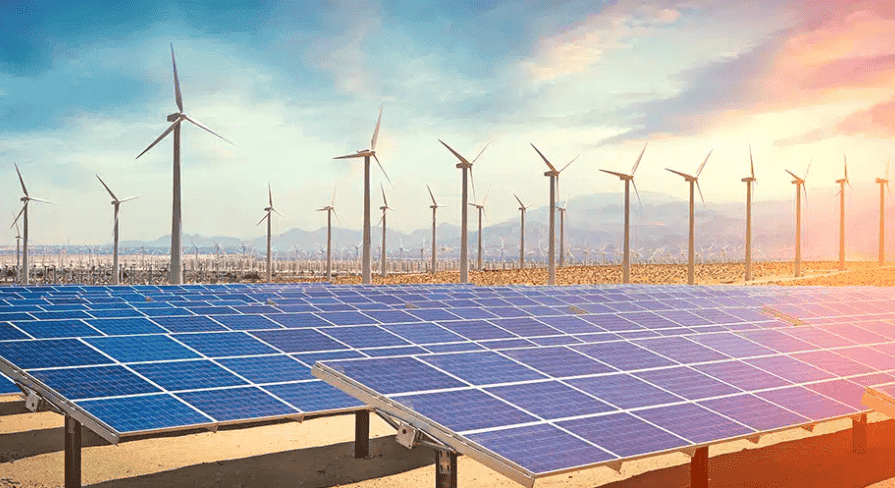 Renewable energy farms in Africa with solar panels and wind turbines at sunset.