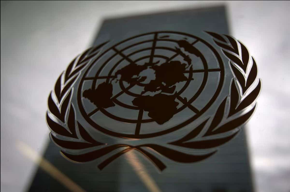 United Nations emblem with world map and olive branches, symbolizing global peace.