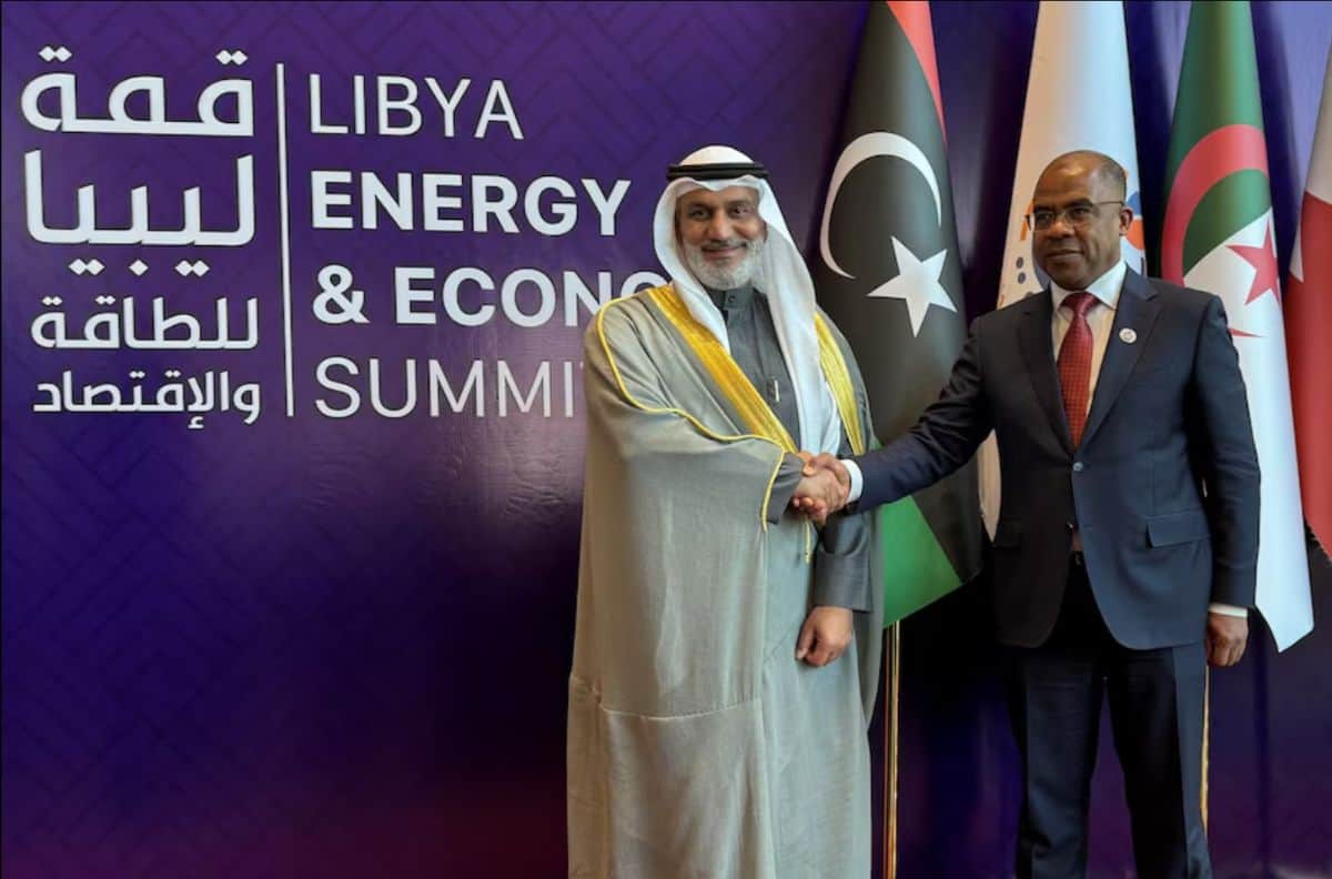 An official handshake between two leaders at the Libya Energy and Economy Summit, highlighting Afric.