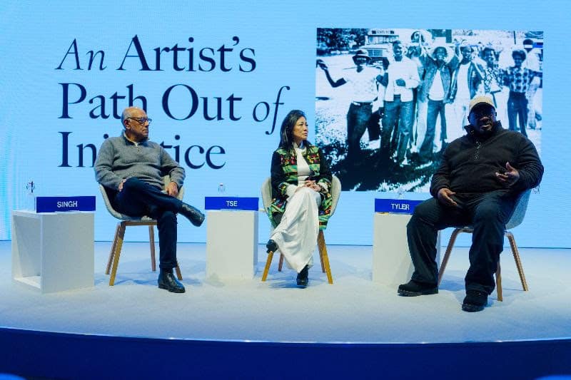 Panel discussion with artists at Africa.com event during President Trump's address.