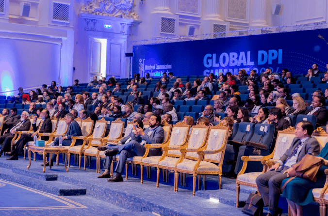 Attendees at the Global DPI Conference focusing on people, partnerships, and progress.