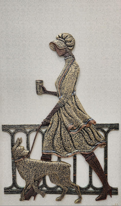 African woman walking with a dog, holding a cup, in intricate traditional attire.