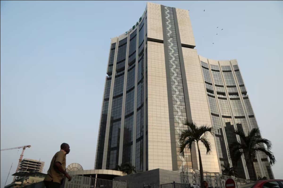 Modern skyscraper in Lagos, Nigeria, showcasing vibrant city life and impressive architecture.