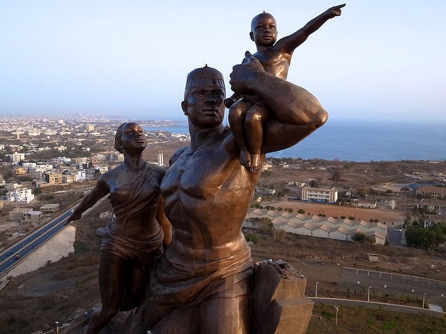 Iconic African sculpture featuring children, symbolizing heritage and unity.