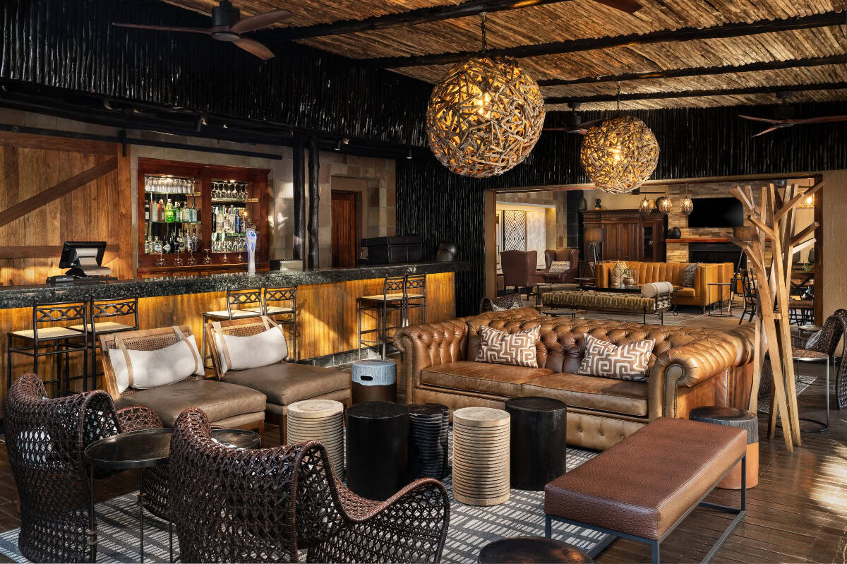 African-inspired lounge with cozy seating and warm lighting.