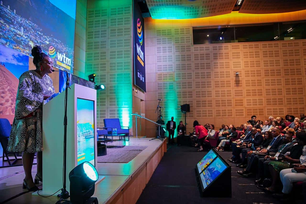Conference speaker presenting at WTM Africa 2025 event.