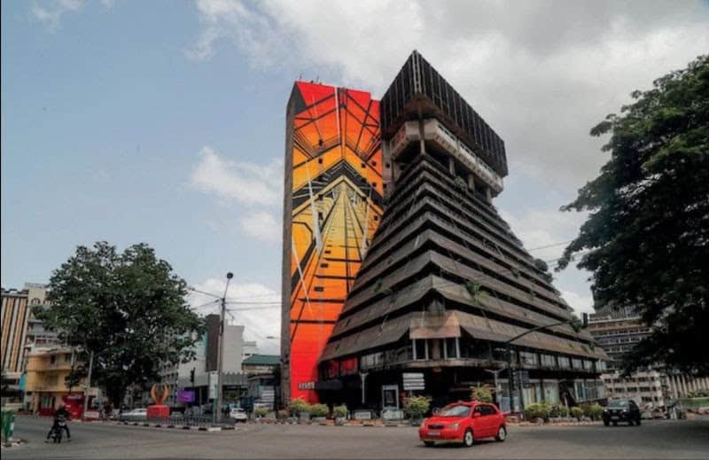 Contemporary African architecture with vibrant mural and innovative design.