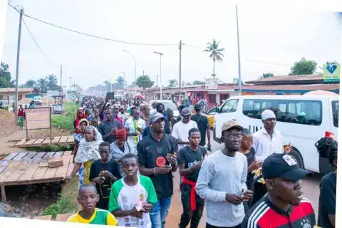 Protesters gather during a memorial event in Central African Republic, highlighting activism and com.