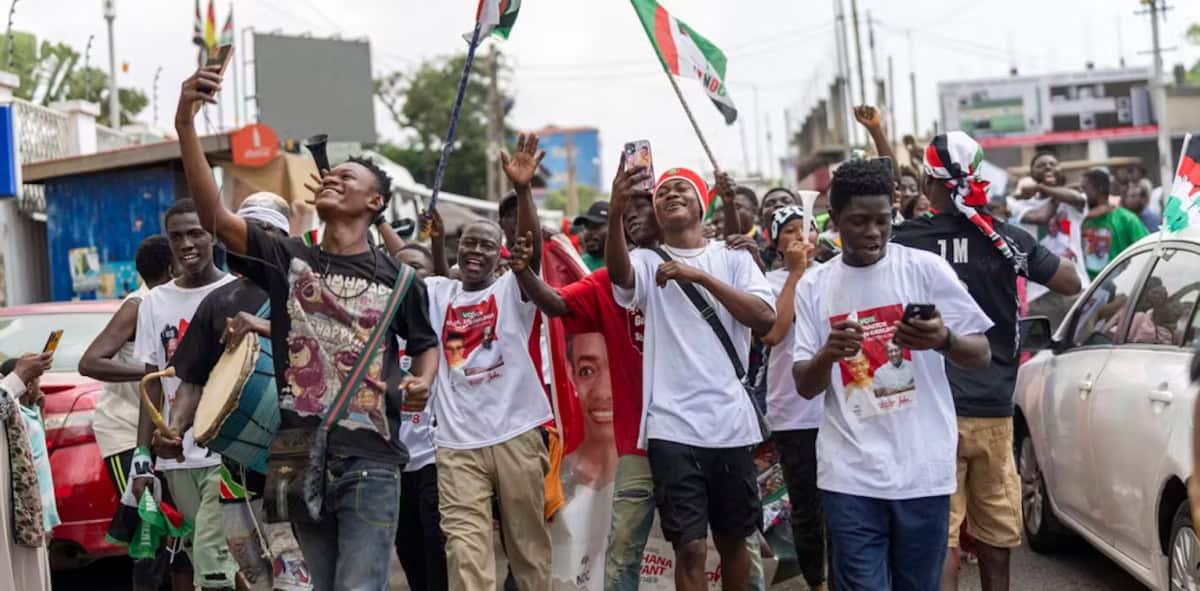 Election rally in Africa promoting safety and security awareness.