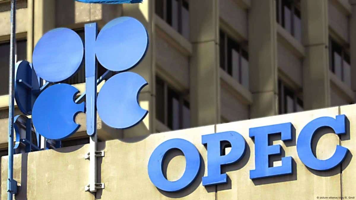 OPEC logo on building facade representing global fossil fuel industry.