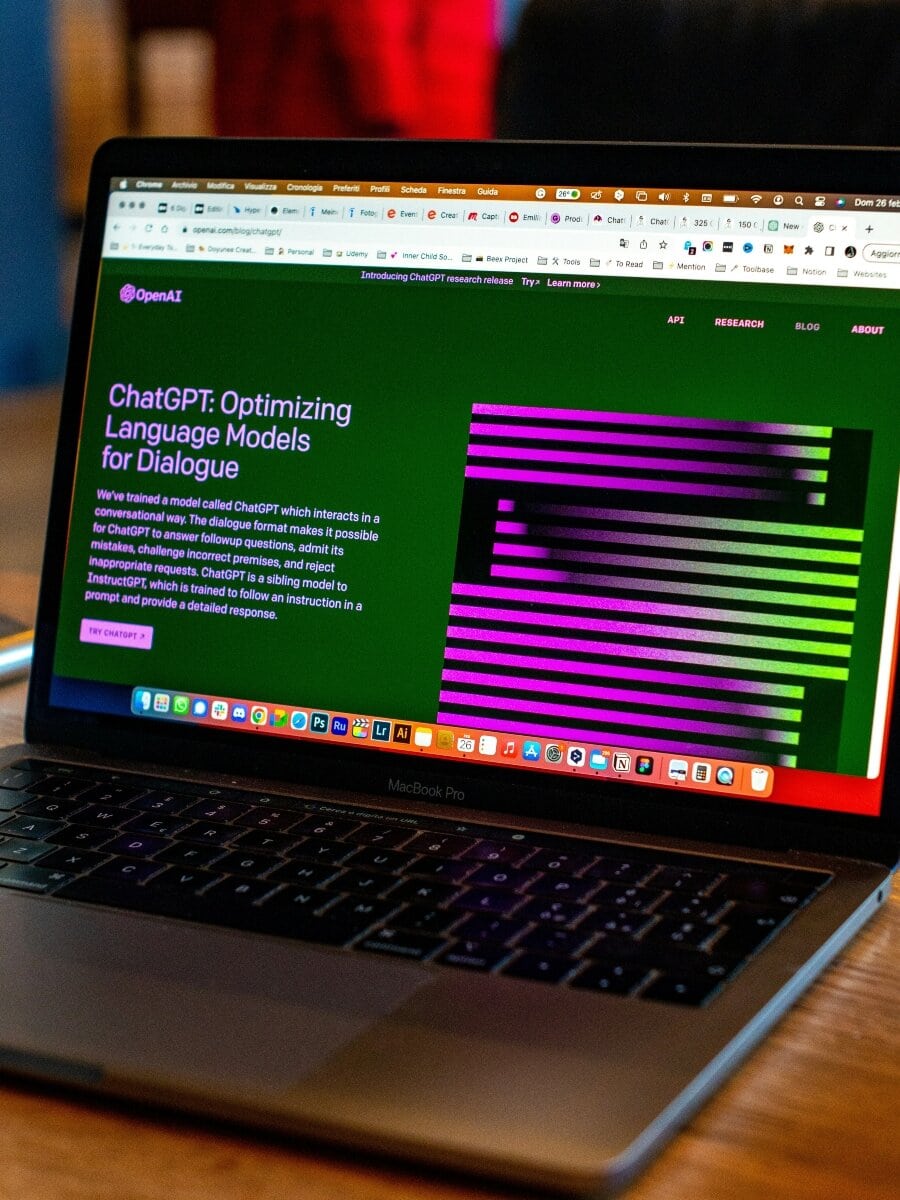 Laptop displaying ChatGPT optimizing language models for dialogue.