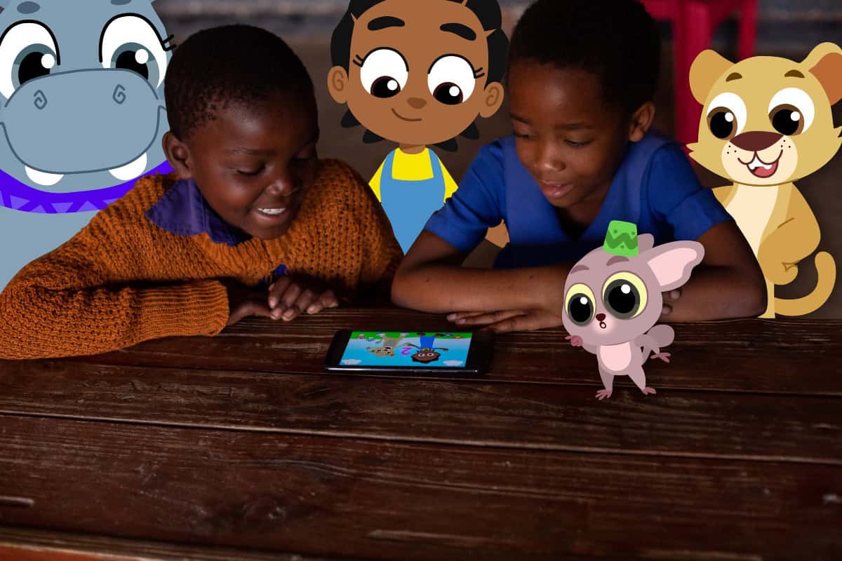 Children engaging with educational content on a tablet, promoting learning and development.