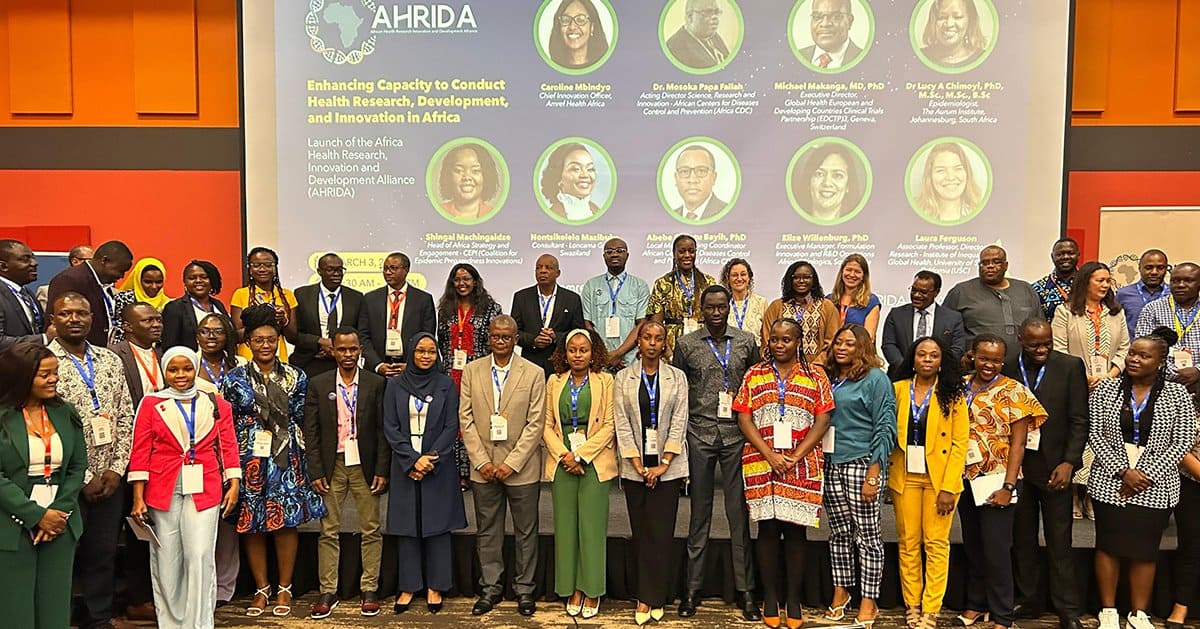 Diverse group of African health researchers at a conference on research capacity.