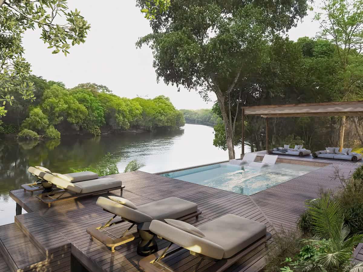 Luxurious poolside lounge at Lolelunga Private Reserve, Zambia.