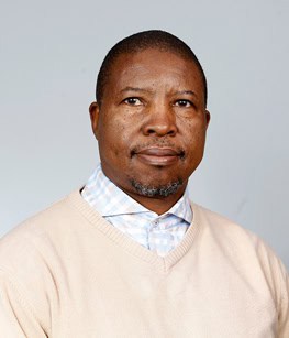 Researcher in Africa promoting health capacity development.