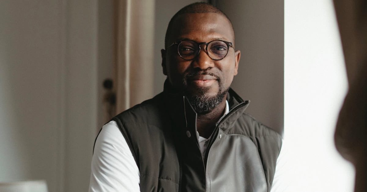 African man discussing innovation and regulation in Africa.