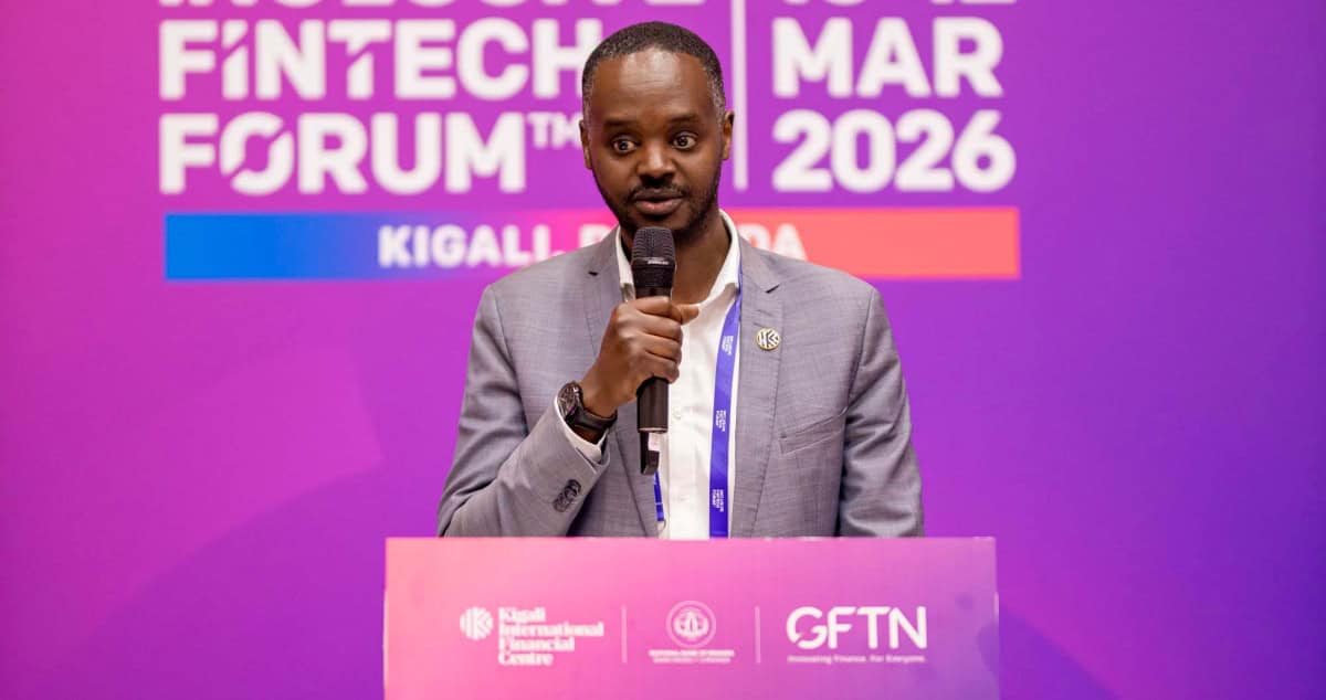 African fintech leader speaking at a conference on financial technology.