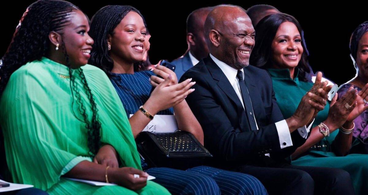 Group of African entrepreneurs and investors smiling at a business event.