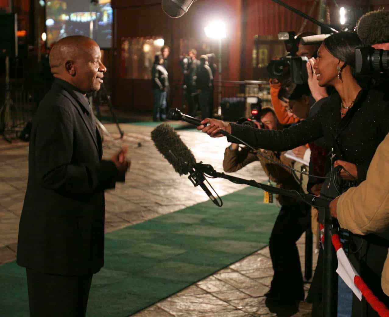 Lebo M being interviewed by media after legal action over Lion King translation controversy.