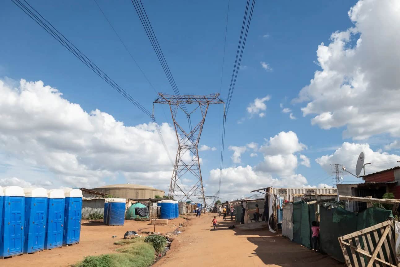 Power transmission lines and rural community in South Africa.