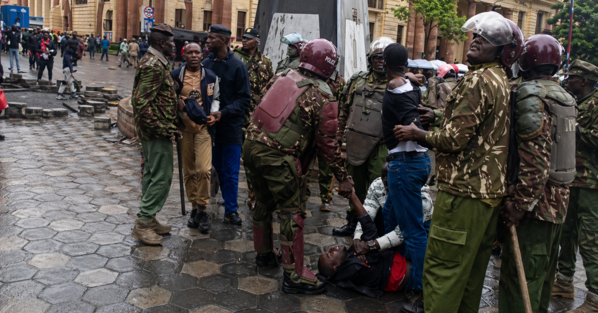 Kenyan police confront protesters during fuel price protests in Nairobi.