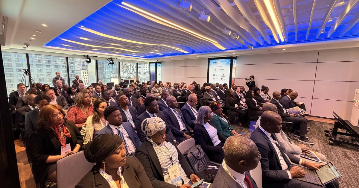 Audience attending a financial conference on West African investment opportunities.