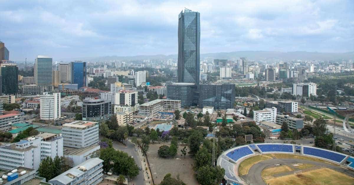 Aerial view of Nairobi's city center featuring tall skyscrapers and urban development in Kenya.
