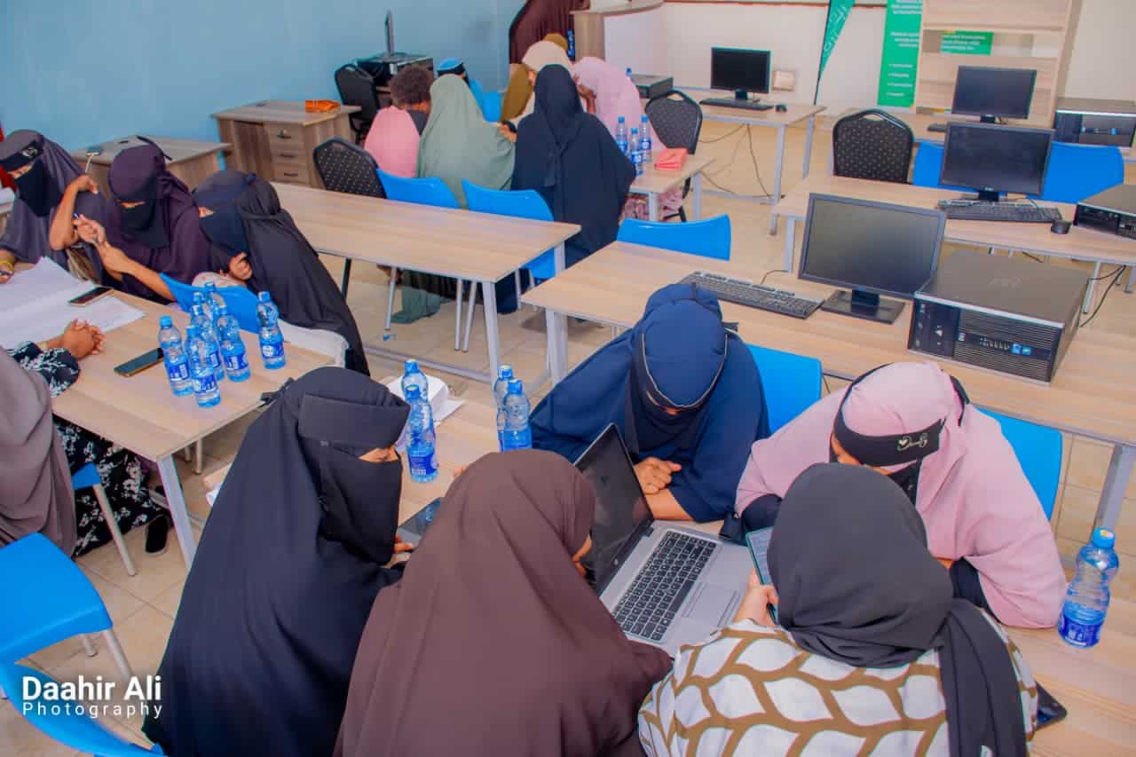 Young women participating in a tech hackathon event in Garissa.