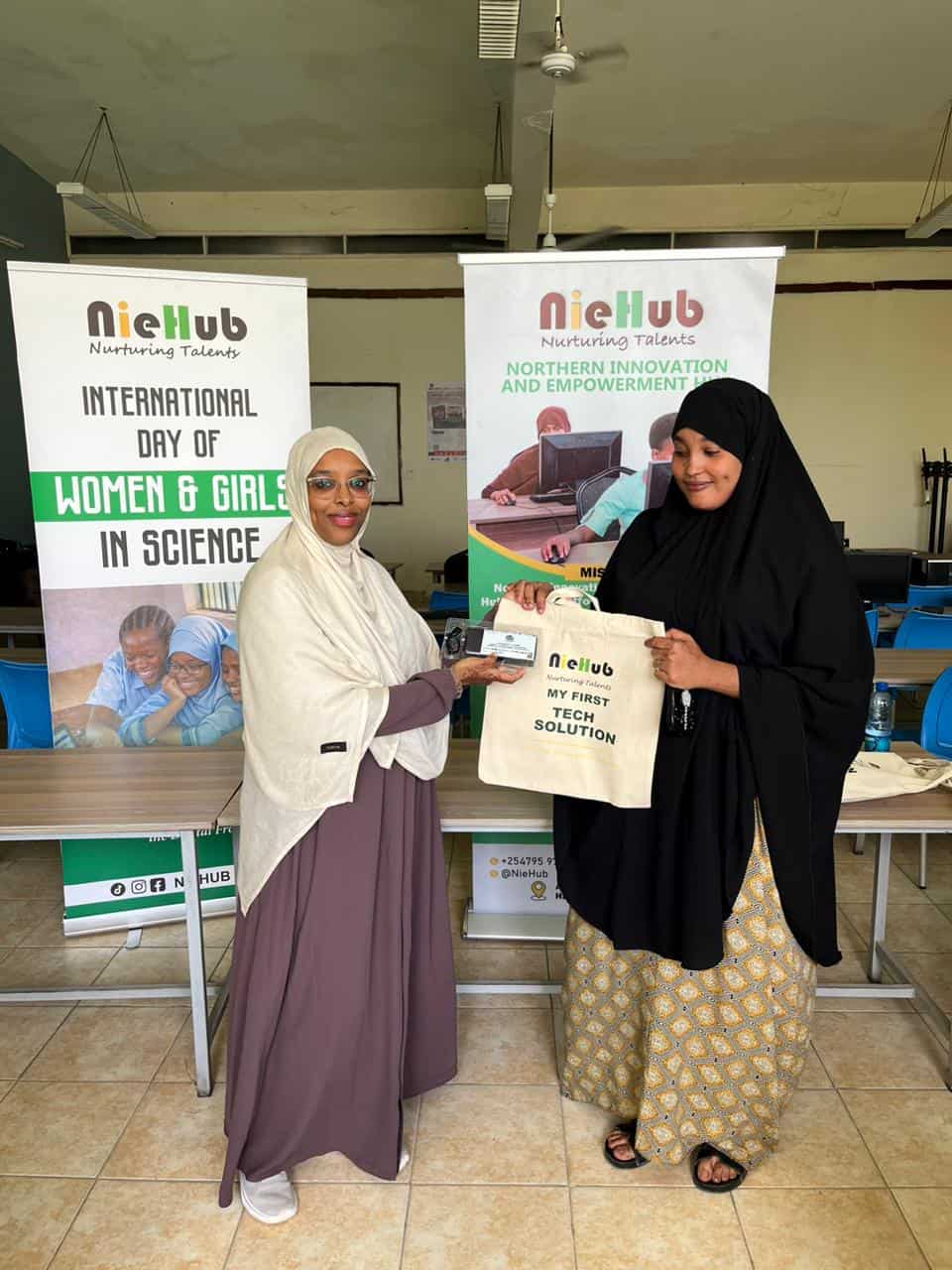 Women and girls in Garissa participating in tech event.