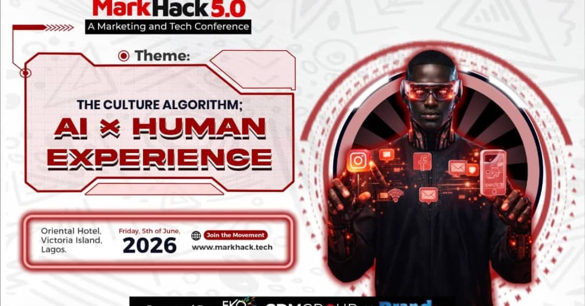 Young man using digital devices to explore African culture and AI at Markhack 5.0 Nigeria event.