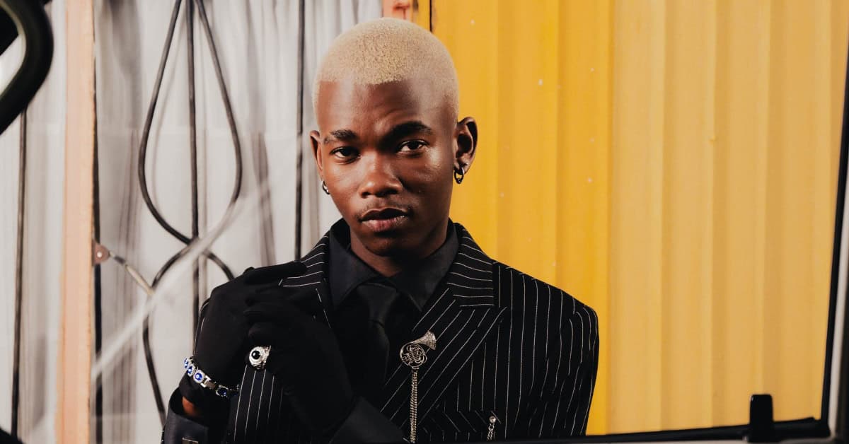 Mordecai, a prominent Amapiano artist from Katlehong, poses confidently in this image.