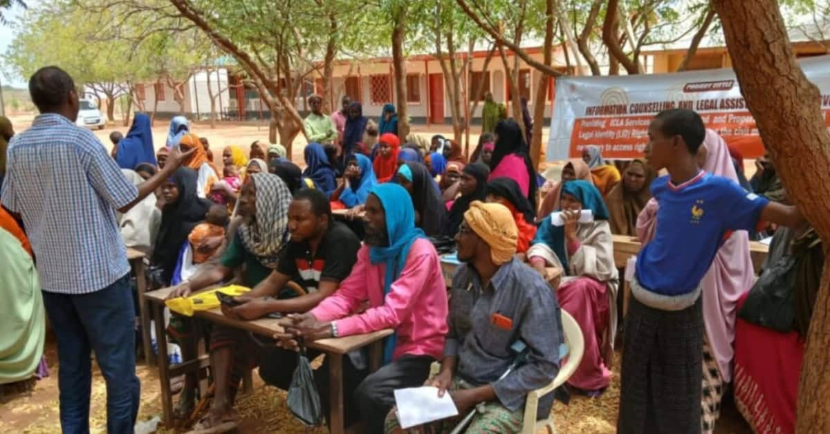 Refugees gather for a community meeting on reclaiming citizenship in Kenya.