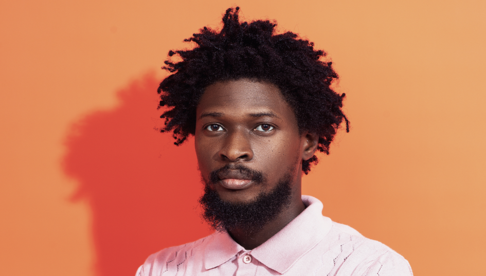 Portrait of a Lagos fashion designer showcasing innovative style.