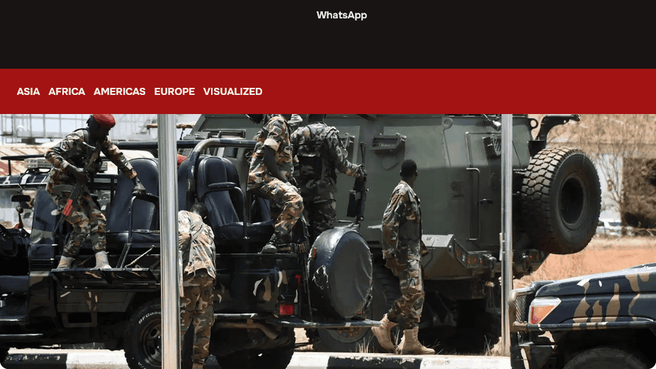 Military personnel boarding a military vehicle in Africa.