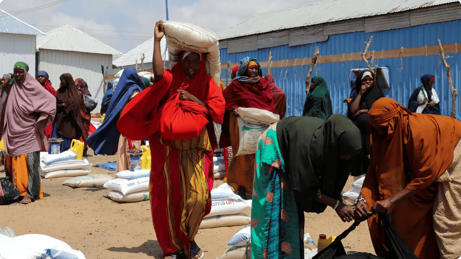 IDP women collecting food aid in Somalia’s drought-affected areas.