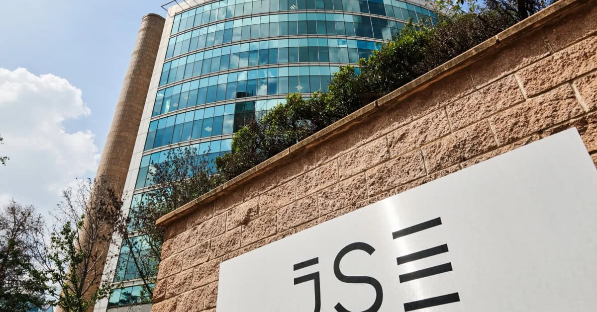 Office building with glass exterior and corporate signage.