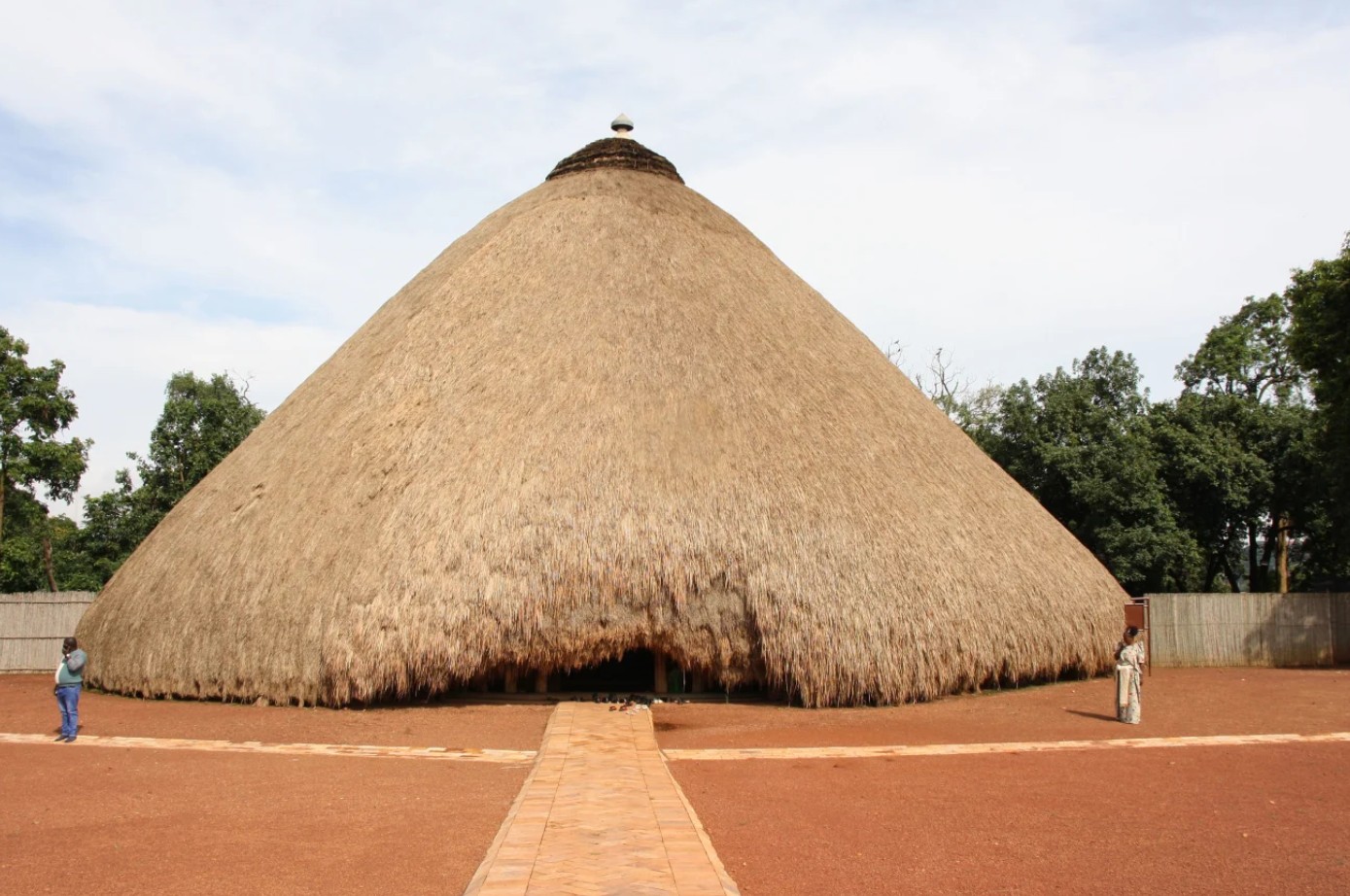 Ancient African thatched hut with a conical roof, showcasing traditional architecture and cultural h.
