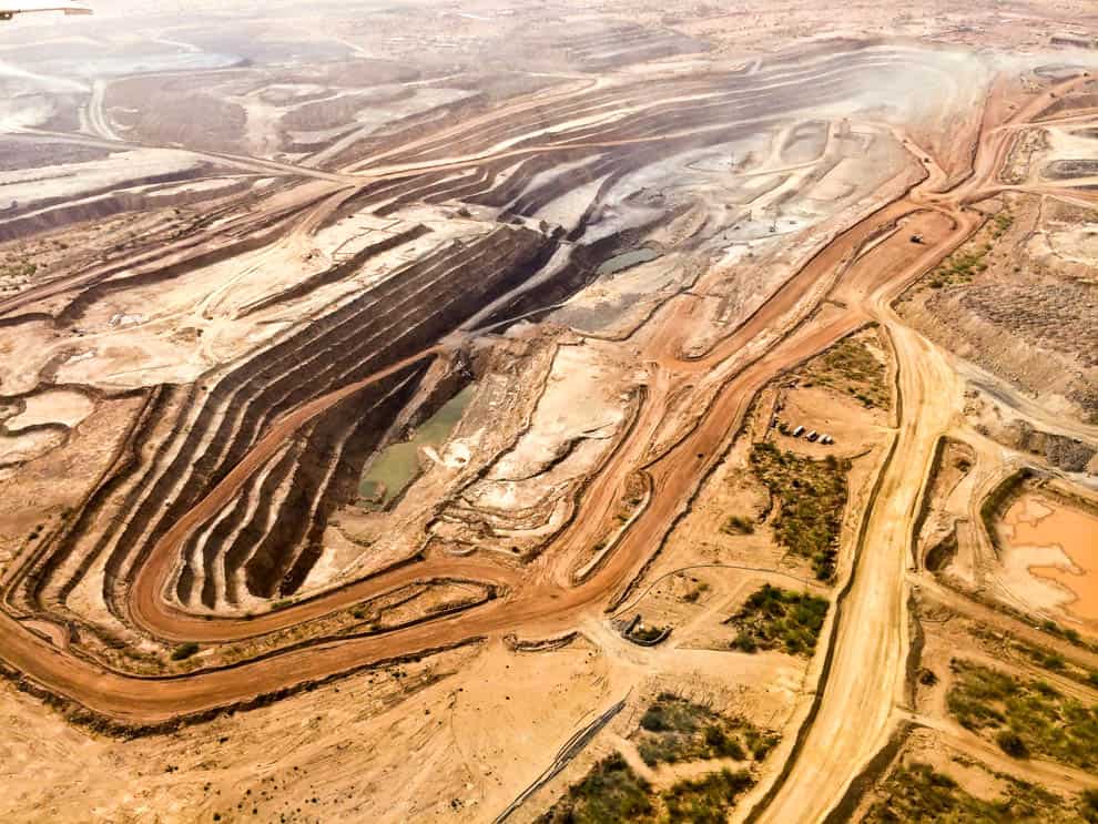 Mining operations in Burkina Faso with open-pit excavation.