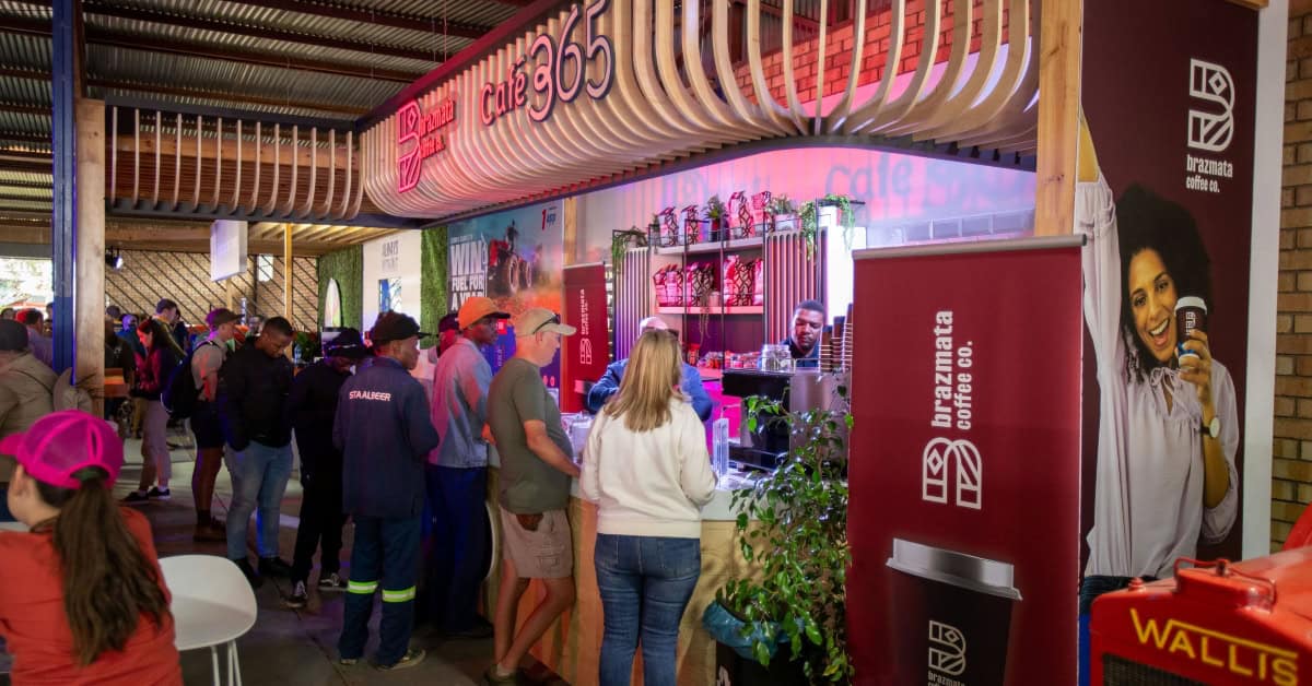 Coffee shop serving beverages at Africa.com event.