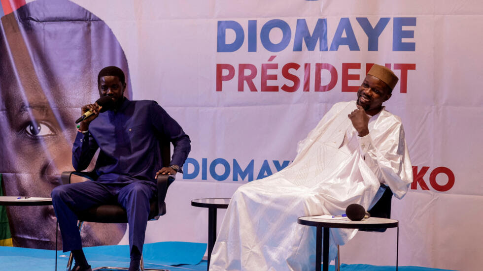 Senegalese politicians Faye and Sonko during a political event in Dakar.