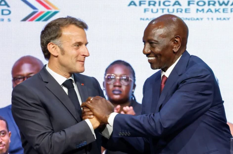 Two African and European leaders shaking hands at Africa summit.