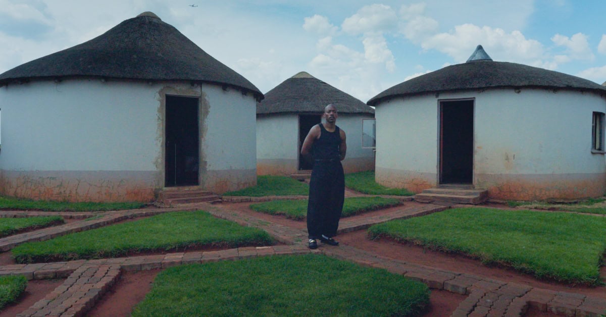 Muzi in traditional Nguni attire at Uhlanga village with Zoe Modiga.