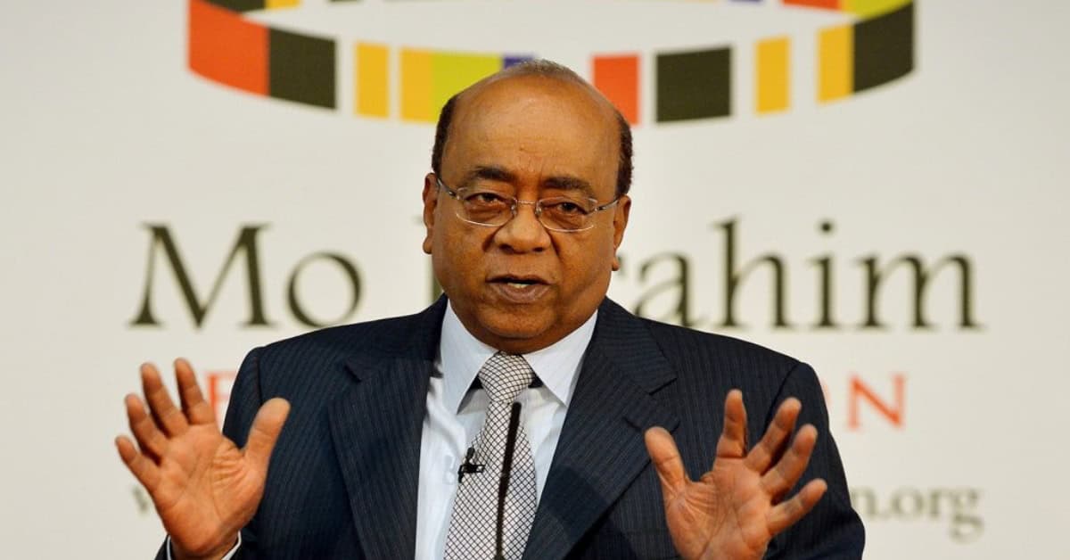 African leader speaking at a conference, emphasizing development and unity in Africa.