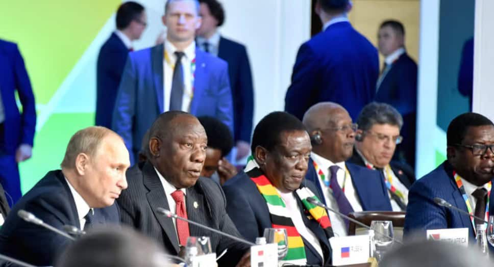 African leaders participating in a global conference meeting.