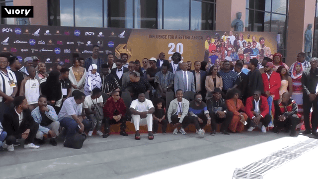 Group of African influencers gathering at Ethiopia social media summit for stereotype awareness.