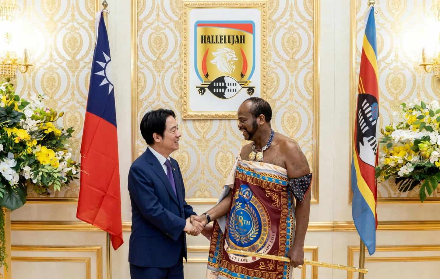 Diplomat handshake between two men in a formal setting in Africa.