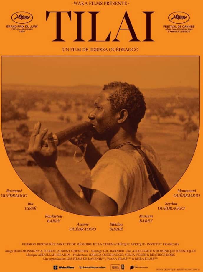 African man playing traditional flute in a rural landscape, showcasing cultural music and heritage.
