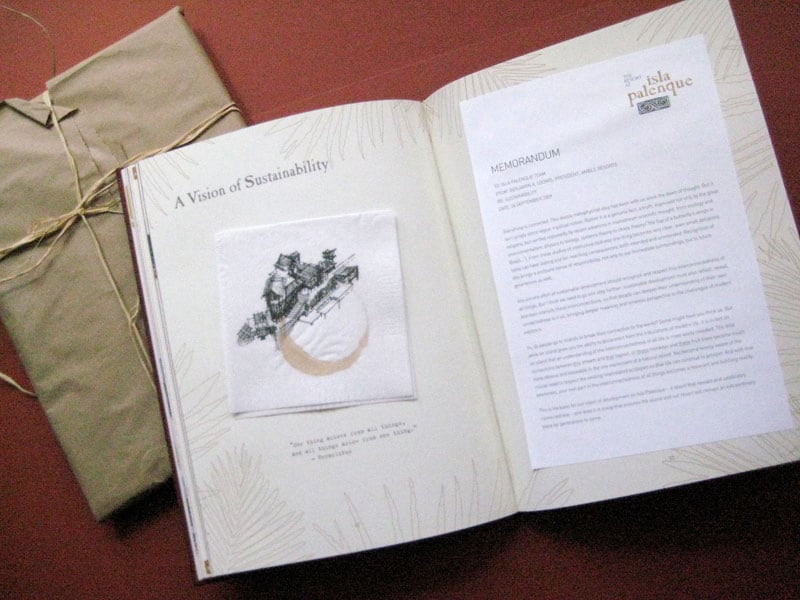 Featured pages displaying glued-in cocktail napkin with hand drawn architectural concept.