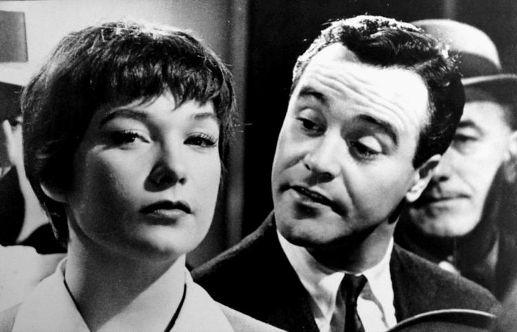 Movie still from "The Apartment" featuring Shirley MacLaine and Jack Lemmon.
